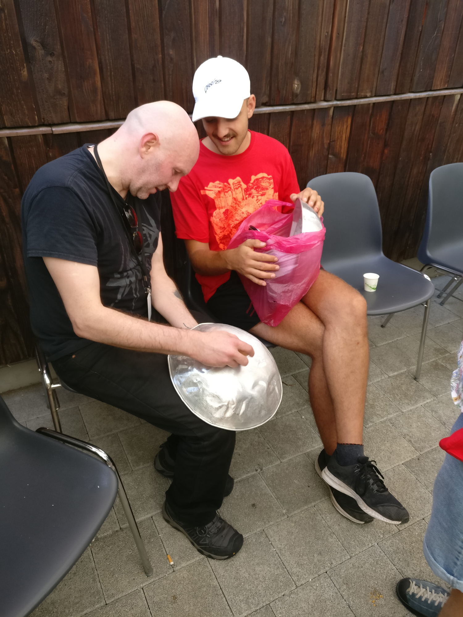 <p>Sean donating wok lids to budding drummer at Jazz Festival Willisau, 2019.</p>
